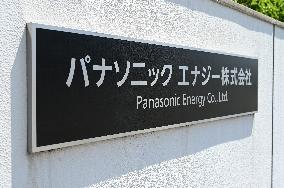 Exterior view and logo of the Panasonic Energy Suminoe Plant.